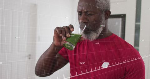 Senior Man Drinking Green Smoothie with Data Overlay