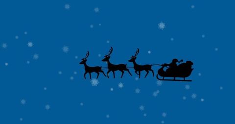Santa and Reindeers Silhouette Flying Under Snowy Sky