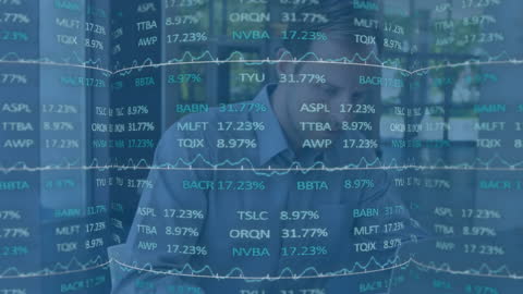 Businessman Analyzing Financial Market Data on Laptop