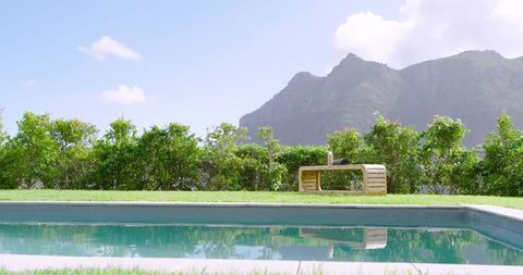 Tranquil Backyard Pool with Mountain View and Wooden Bench
