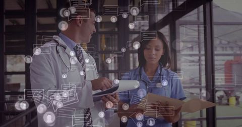 Doctors and nurses collaborating with digital healthcare technology