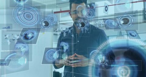 Man interacts with futuristic holographic interface in tech lab