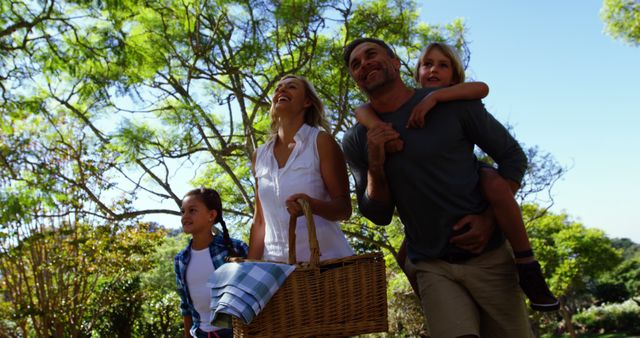 Diverse Family Enjoying Sunny Picnic Outdoors with Blank Copy Space for Text - Download Free Stock Images Pikwizard.com