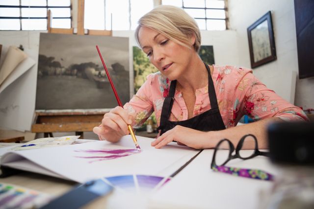 Woman Painting in Art Studio - Download Free Stock Photos Pikwizard.com