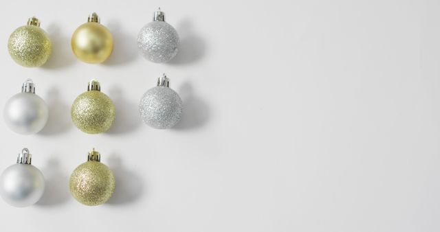Image of christmas baubles and copy space on white background. christmas, tradition and celebration concept.