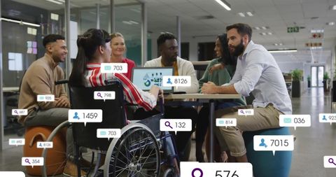 Diverse Team Engaging in Meeting with Social Media Tracking Interface