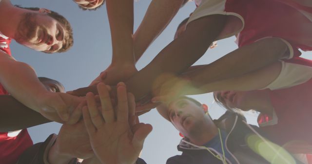 Team Huddle Under Blue Sky with Sunflare - Download Free Stock Images Pikwizard.com