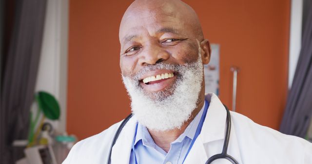 Confident Senior African-American Doctor Smiling in Hospital Setting - Download Free Stock Images Pikwizard.com