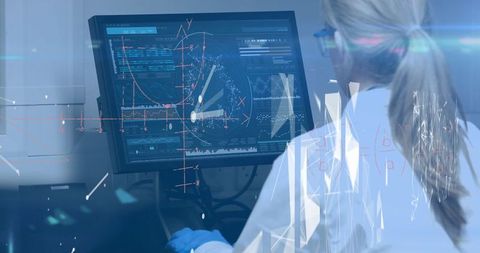 Scientist Analyzing Data on Futuristic Computer - Download Free Stock Images Pikwizard.com