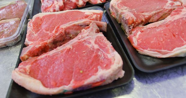 Raw Beef Steaks Displayed in Grocery Store Meat Section - Download Free Stock Images Pikwizard.com