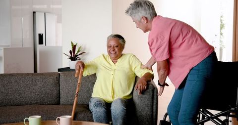 Caring senior couple supporting each other at home