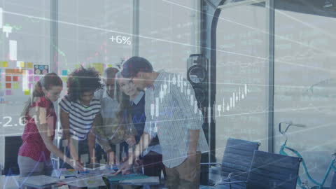 Diverse Team Brainstorming Financial Data Analytics in Modern Office