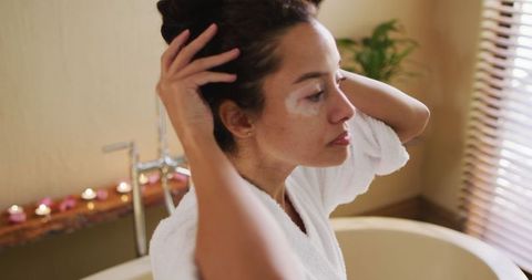 Biracial Woman Enjoying Self-Care Routine at Home