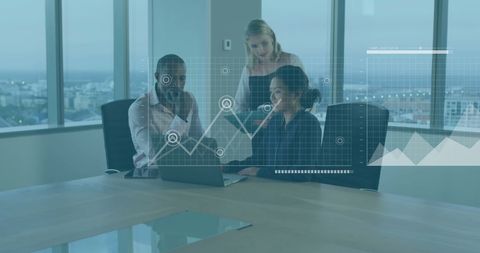 Diverse Team Analyzing Digital Finance Data in Modern Office