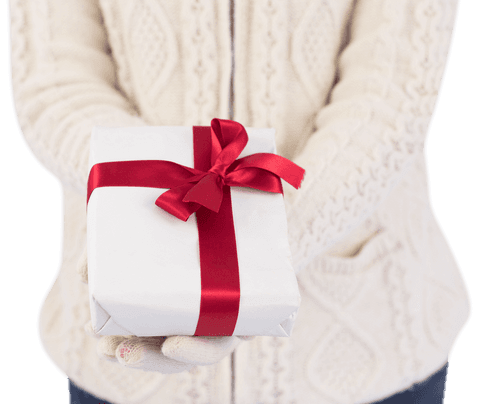 woman in knit sweater holding transparent white gift with red ribbon - Download Free Stock Videos Pikwizard.com