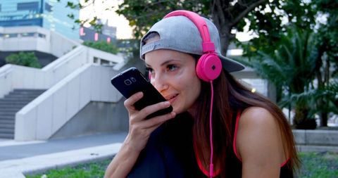 Urban Female Street Dancer Using Smartphone Outdoors - Download Free Stock Images Pikwizard.com