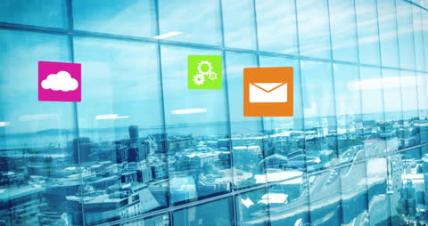 Digital Icons Reflecting Over Modern Cityscape with Glass Windows