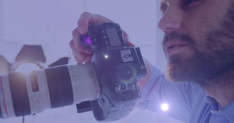 Caucasian photographer capturing picture with professional camera