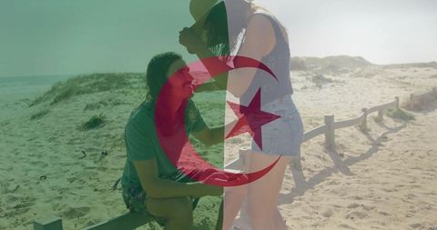 Romantic beach proposal with algerian theme, man presenting engagement ring