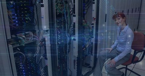 Technician in Modern Data Center Surrounded by Server Racks and Technology