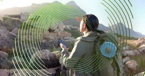 Hiker exploring trail with gps assisted navigation