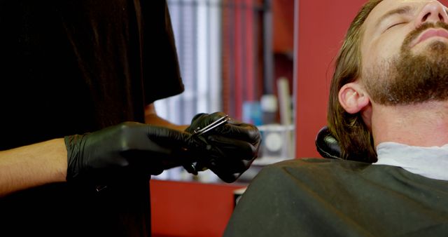 Barber Shaping Beard for Relaxed Client in Modern Barber Shop - Download Free Stock Images Pikwizard.com