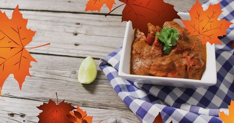 Autumn leaves frame spicy food dish concept