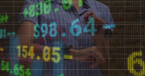 Professional checking smartwatch with stock market data overlay and wearable analytics