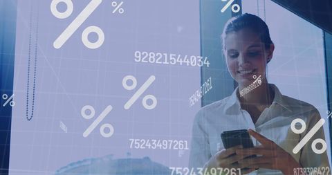 Businesswoman using smartphone with percentage icons overlay