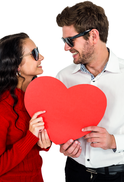 Happy Couple Holding Red Heart Cutout, Wearing Transparent Glasses - Download Free Stock Videos Pikwizard.com