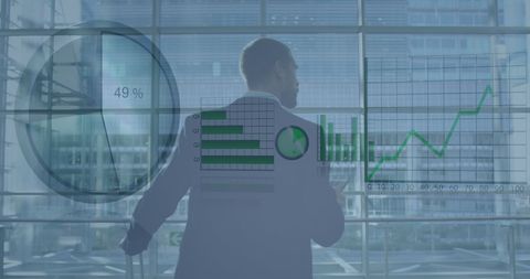 Businessman Analyzing Financial Growth with Graphs and Charts - Download Free Stock Images Pikwizard.com