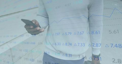 Business professional analyzing data with smartphone and suitcase