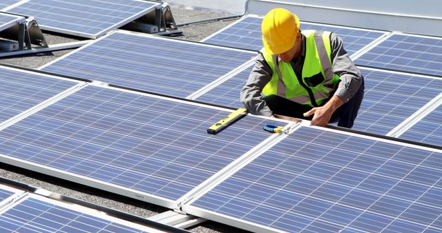 Engineer Maintaining Solar Panels for Sustainable Energy - Download Free Stock Images Pikwizard.com