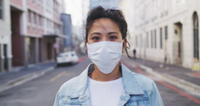 Woman Wearing Protective Face Mask in Urban Street - Download Free Stock Images Pikwizard.com