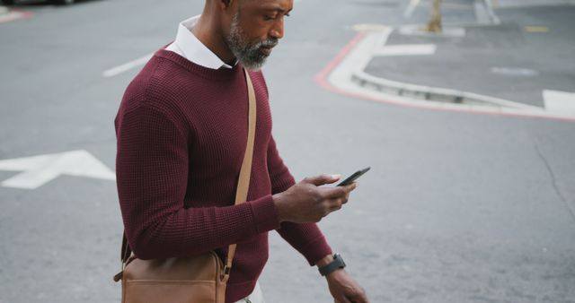 Man Walking on Street Using Smartphone - Download Free Stock Images Pikwizard.com