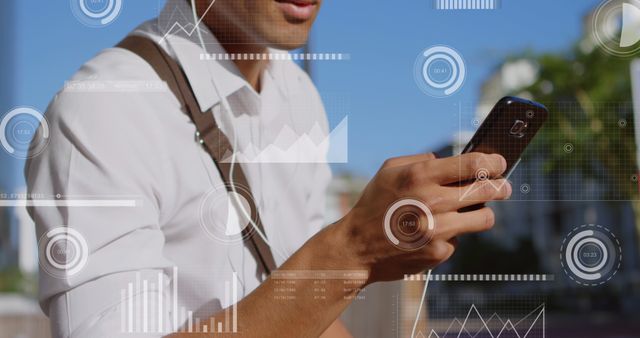 Businessman is analyzing data on a smartphone while using a futuristic interface. Digital graphs and data overlays demonstrate a high-tech environment. Perfect for illustrating technology trends, business analytics, and professional mobile use in an urban setting.