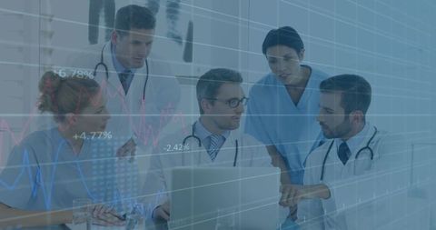 Medical team analyzing financial data on laptop interface