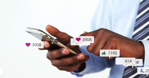 Business Professional Engaging on Smartphone with Social Media Reactions