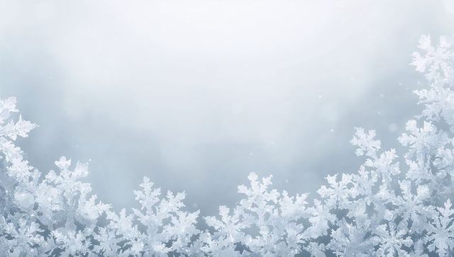 Frosty snowflake border creating serene winter background with delicate ice crystals