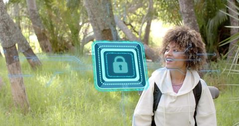 Young hiker encountering holographic padlock symbolizing data security in nature