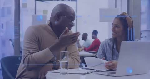 Senior Mentor Guiding Young Professional with Business Data Insights