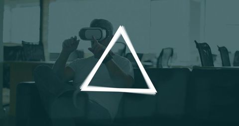 VR Headset in Modern Office with Minimalist Triangle Overlay