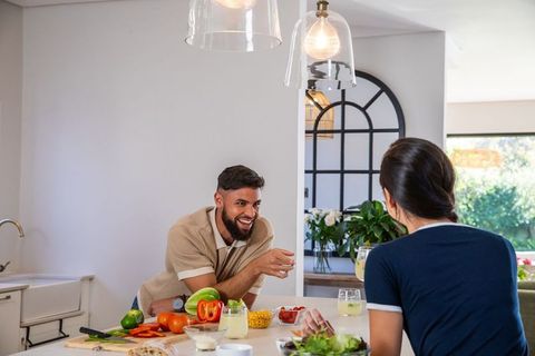 Couple Enjoying Culinary Activity in Bright Modern Kitchen
