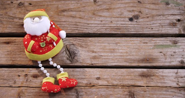 Plush Santa Claus Decoration on Wooden Background - Download Free Stock Images Pikwizard.com