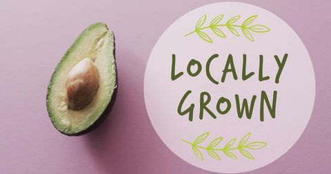 Locally grown avocado with text on pink background