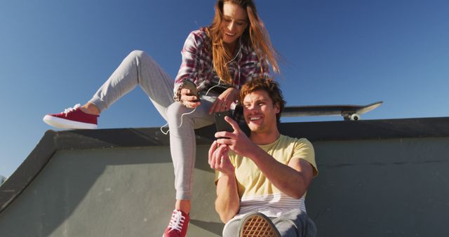 Young Adults Enjoying Leisure Time at Skate Park - Download Free Stock Images Pikwizard.com