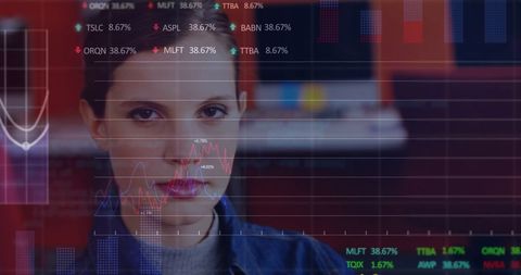 Businesswoman Concentrating on Virtual Financial Data Analytics