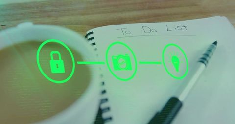Green holographic productivity icons over to do list notebook with coffee cup and pen