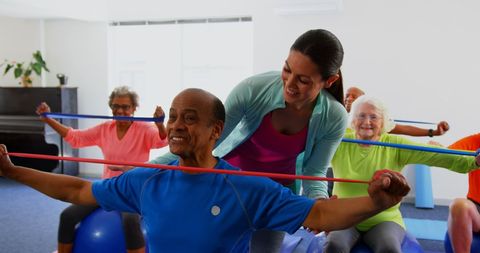 Senior Fitness Class with Trainer and Resistance Bands - Download Free Stock Images Pikwizard.com