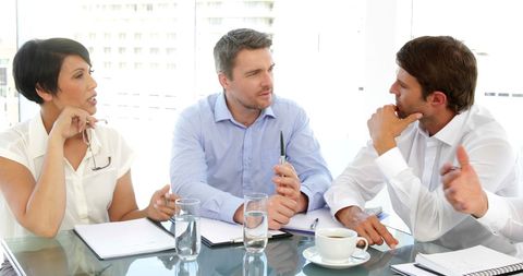 Business Team Engaged in Meeting Discussion - Download Free Stock Images Pikwizard.com